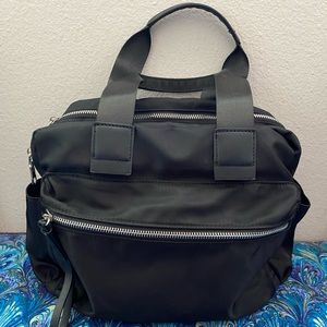 COLAB Black nylon hand bag with zippers.